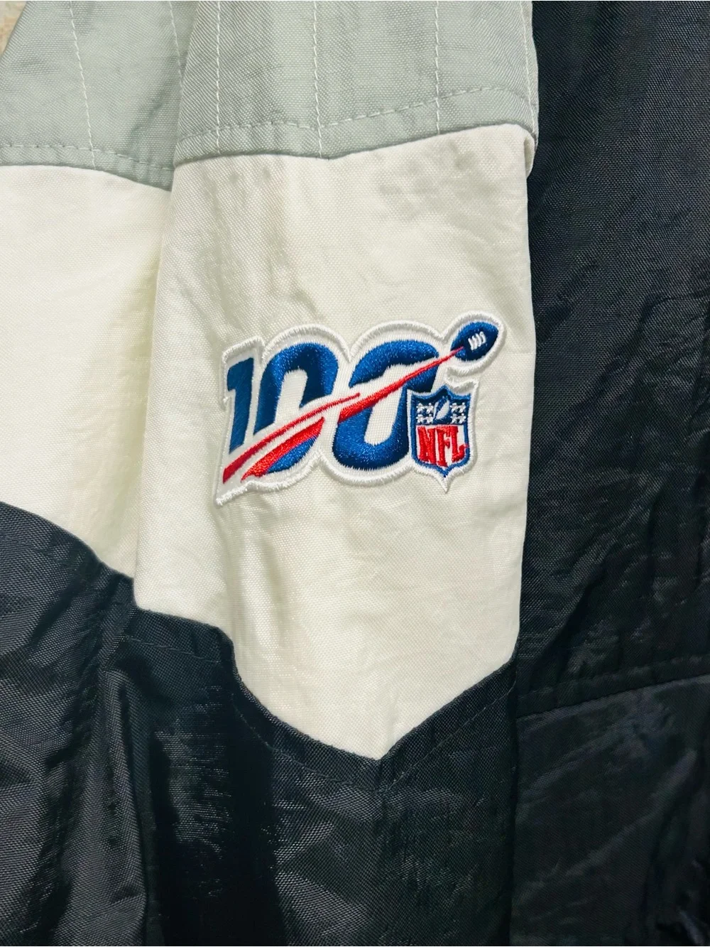 Vintage 90s Starter Oakland Raiders NFL Puffer Jacket Pullover Pouch Black